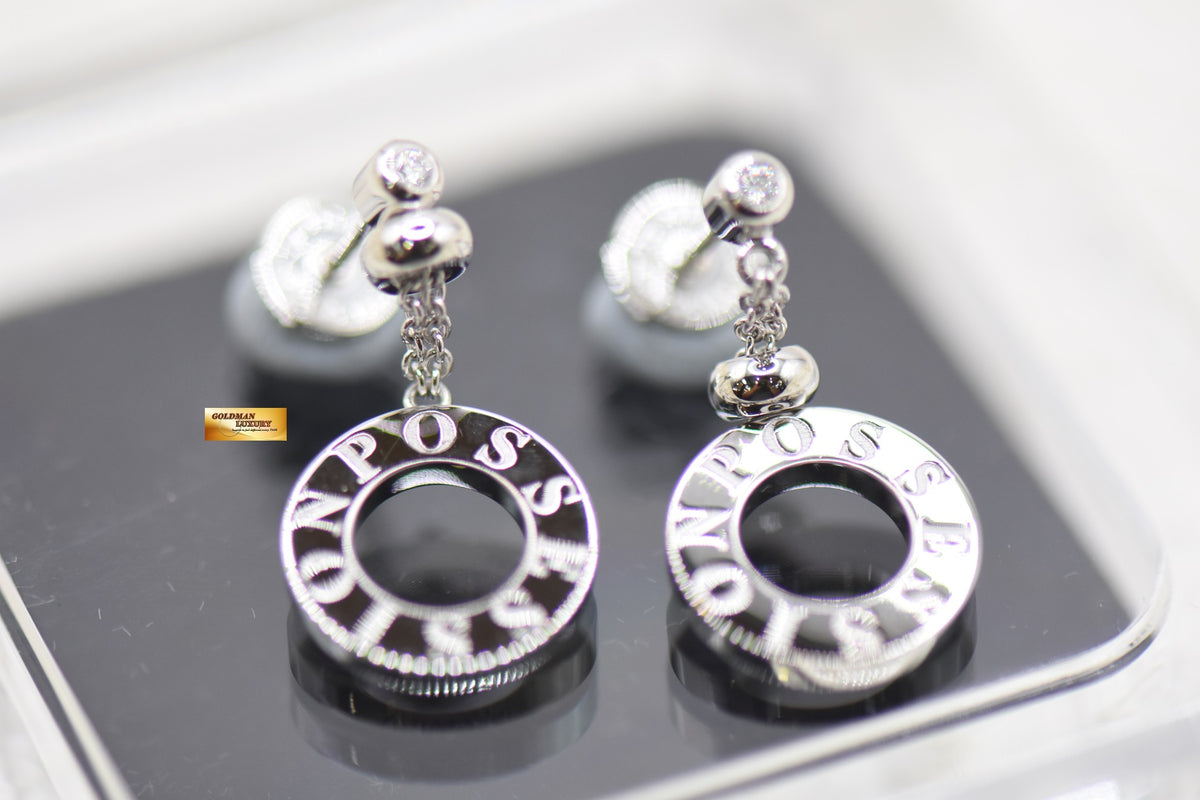 PIAGET POSSESSION WHITE GOLD EARRINGS W/1 DIAMOND