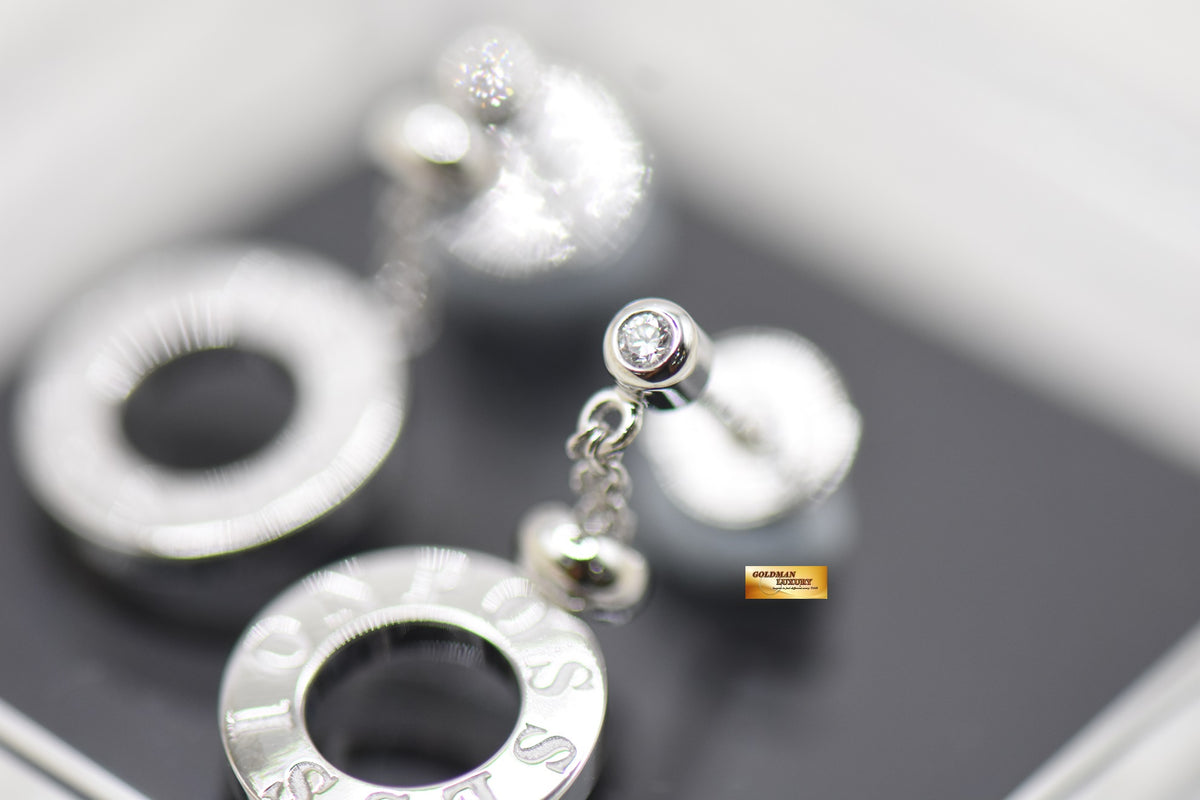 PIAGET POSSESSION WHITE GOLD EARRINGS W/1 DIAMOND