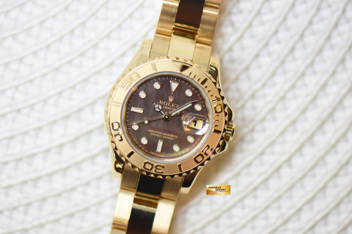 ROLEX OYSTER YACHTMASTER 29mm YELLOW GOLD IN BRACELET TAHITIAN MOP DIAL 169628 (MINT)