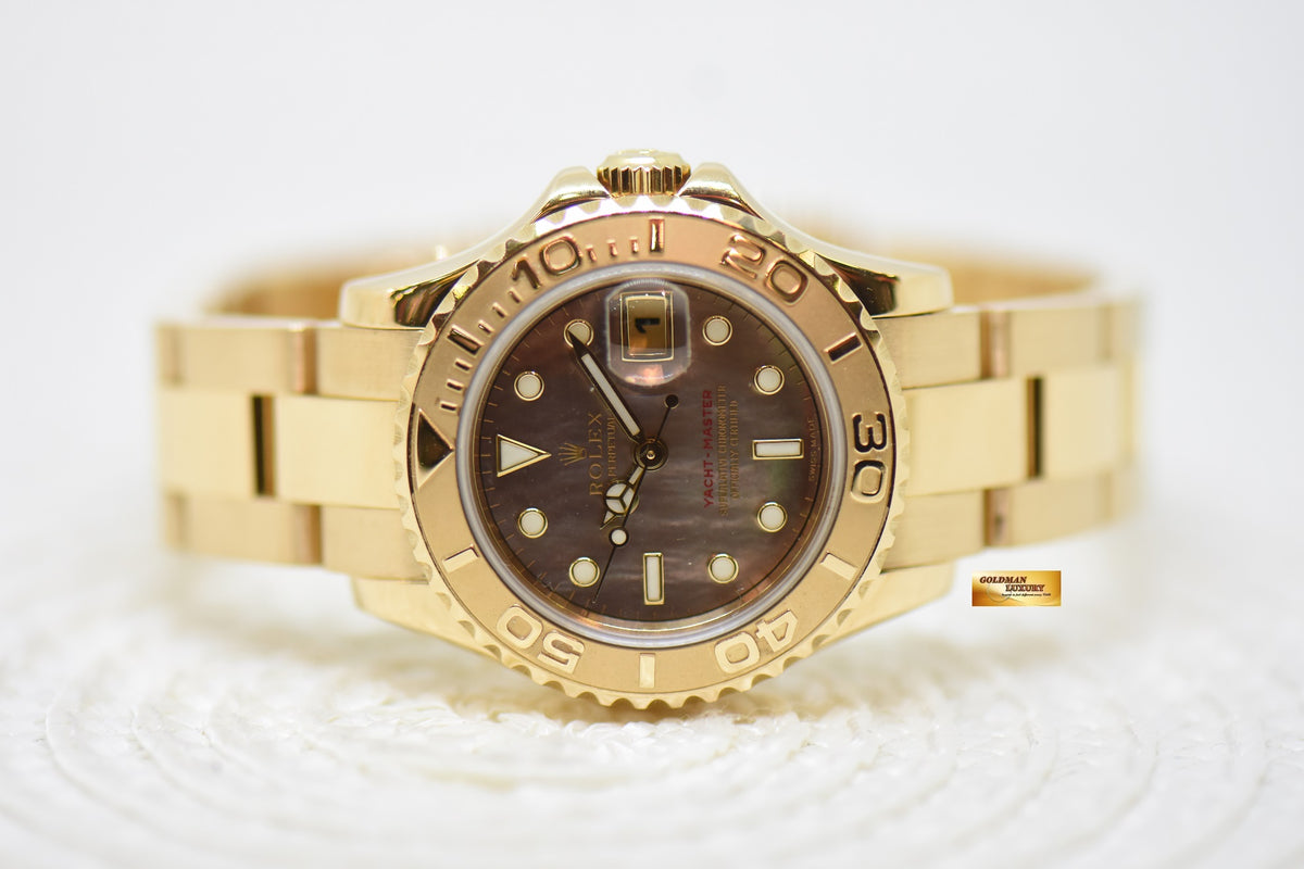 ROLEX OYSTER YACHTMASTER 29mm YELLOW GOLD IN BRACELET TAHITIAN MOP DIAL 169628 (MINT)