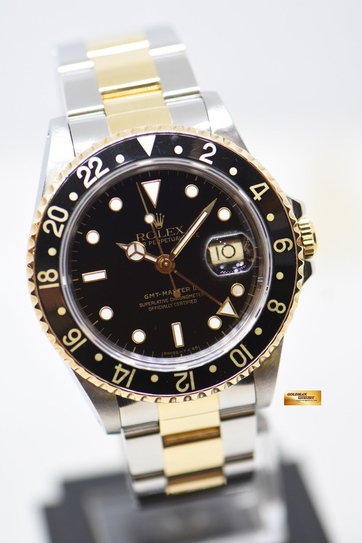 ROLEX OYSTER GMT-MASTER II 40mm HALF-GOLD IN OYSTER BRACELET BLACK TRITIUM DIAL 16713 (MINT)