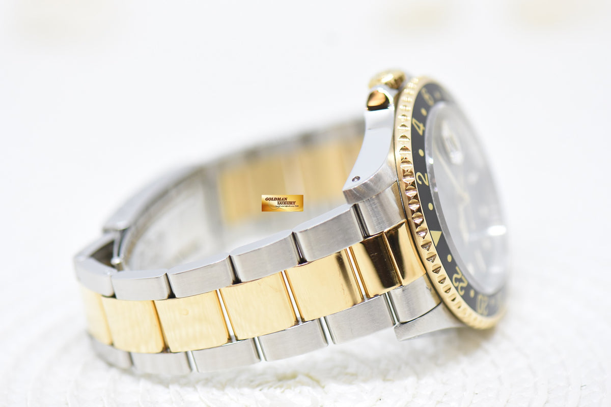 ROLEX OYSTER GMT-MASTER II 40mm HALF-GOLD IN OYSTER BRACELET BLACK TRITIUM DIAL 16713 (MINT)