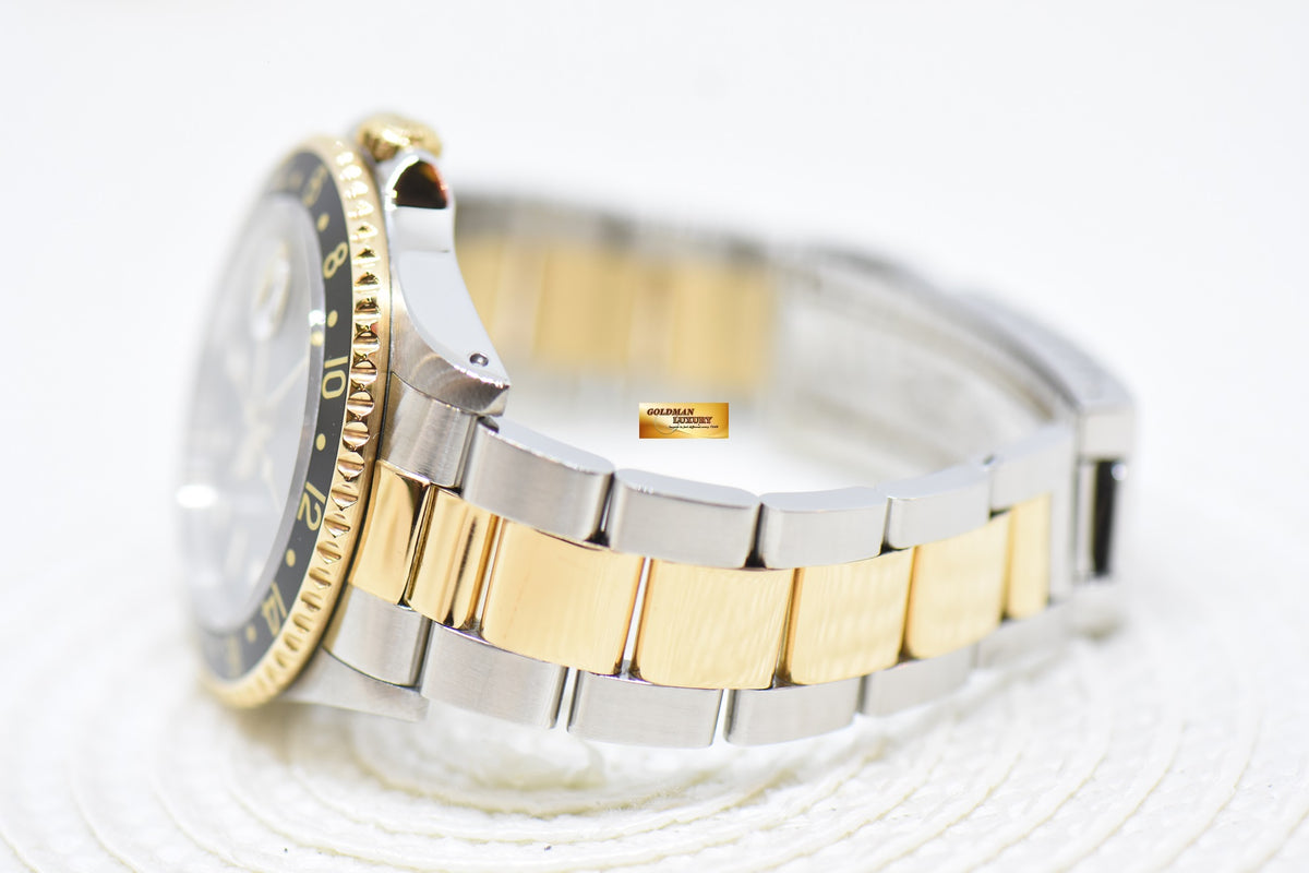 ROLEX OYSTER GMT-MASTER II 40mm HALF-GOLD IN OYSTER BRACELET BLACK TRITIUM DIAL 16713 (MINT)