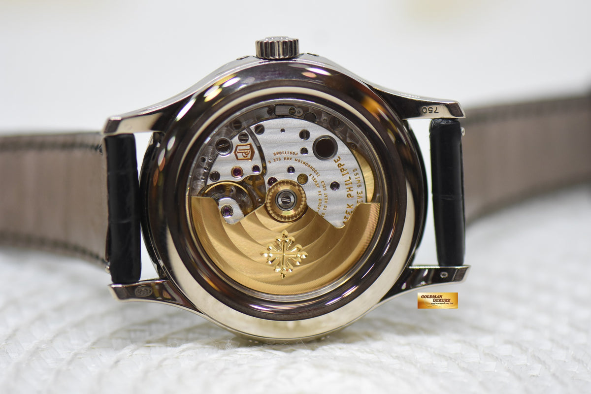 PATEK PHILIPPE ANNUAL CALENDAR 40mm MOONPHASE WHITE GOLD IN GREY DIAL AUTOMATIC 5205G (MINT)