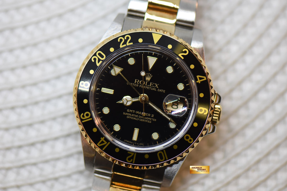 ROLEX OYSTER GMT-MASTER II 40mm HALF-GOLD IN OYSTER BRACELET BLACK TRITIUM DIAL 16713 (MINT)