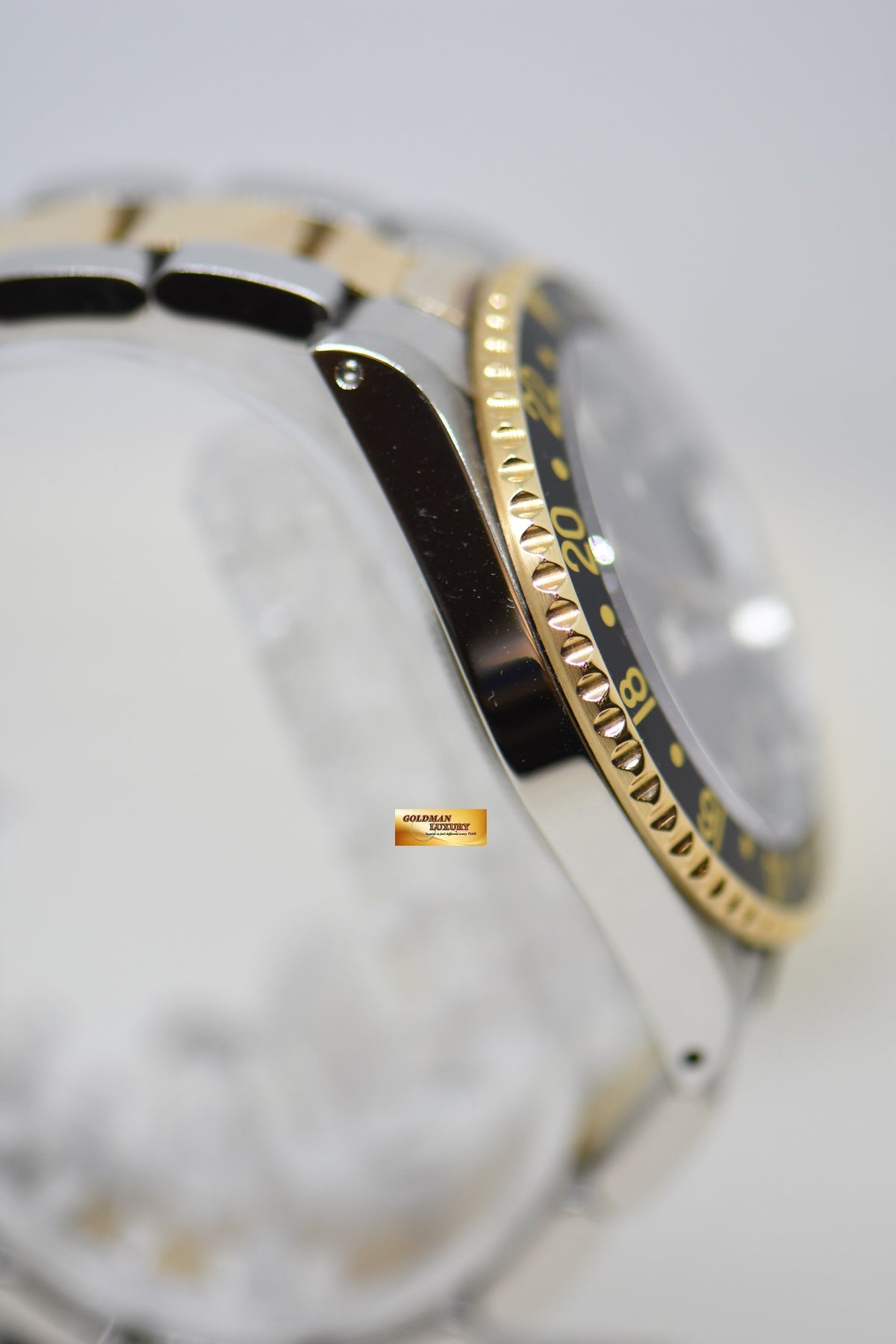 ROLEX OYSTER GMT-MASTER II 40mm HALF-GOLD IN OYSTER BRACELET BLACK TRITIUM DIAL 16713 (MINT)