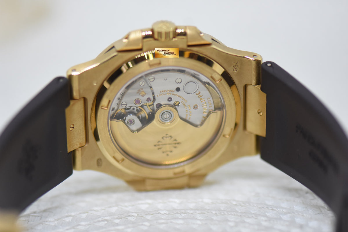 PATEK PHILIPPE NAUTILUS 40mm 18K YELLOW GOLD SILVER DIAL AUTOMATIC 5711/1J (MINT)