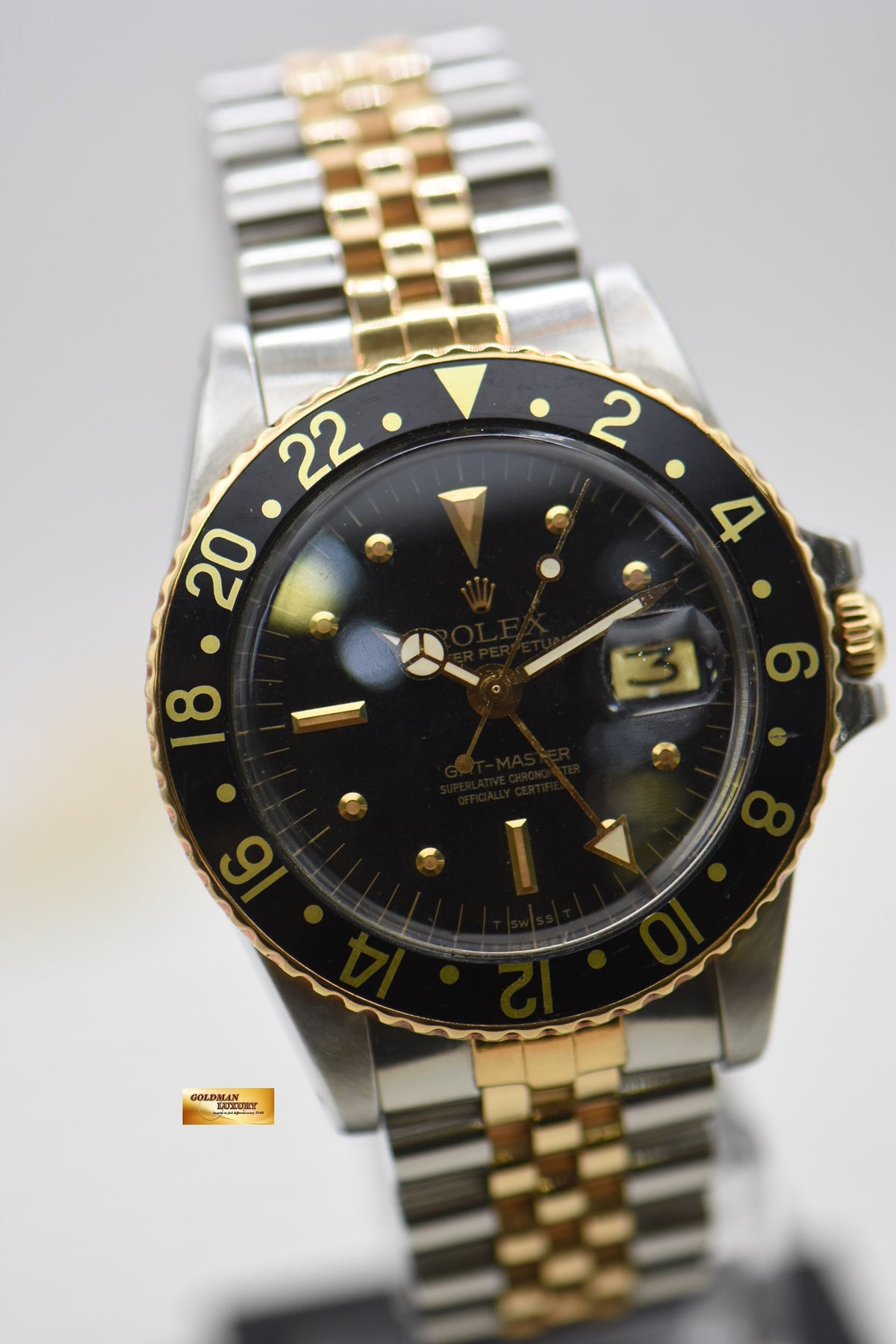 ROLEX OYSTER GMT-MASTER HALF-GOLD IN JUBILEE BRACELET NIPPLE BLACK DIAL 1675 (VINTAGE – AGING DIAL)