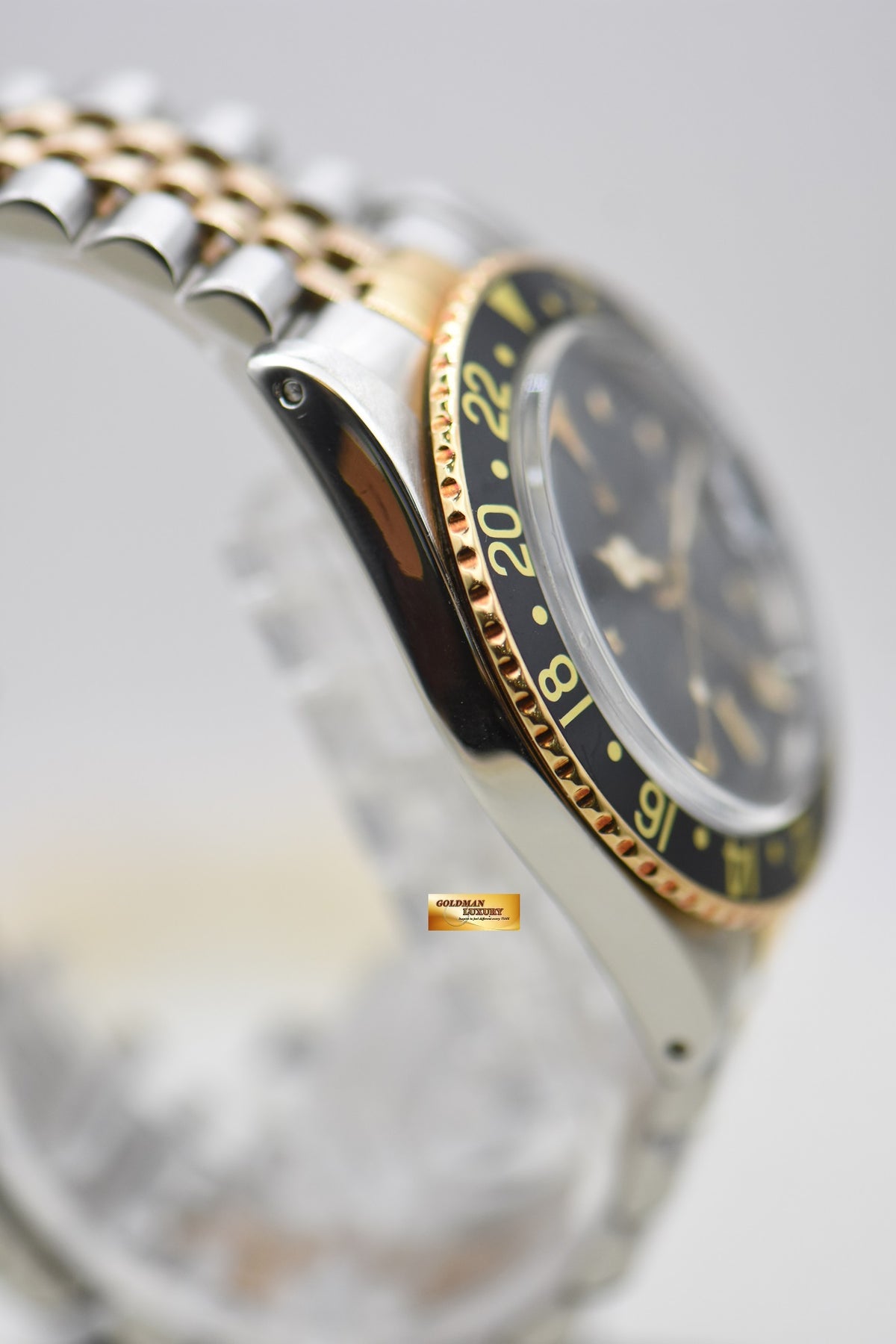 ROLEX OYSTER GMT-MASTER HALF-GOLD IN JUBILEE BRACELET NIPPLE BLACK DIAL 1675 (VINTAGE – AGING DIAL)