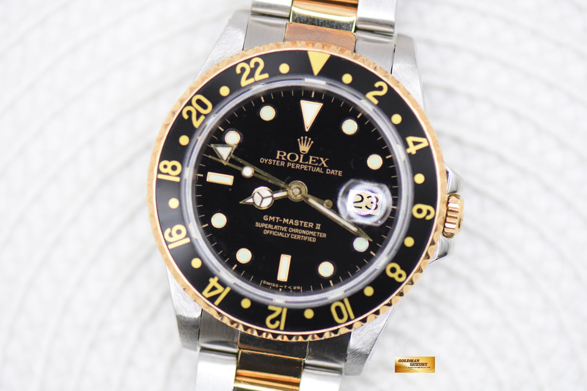 ROLEX OYSTER PERPETUAL GMT-MASTER 40mm HALF-GOLD OYSTER IN BRACELET BLACK “SWISS” DIAL 16753 (TRANSITIONAL-MODEL) (MINT)