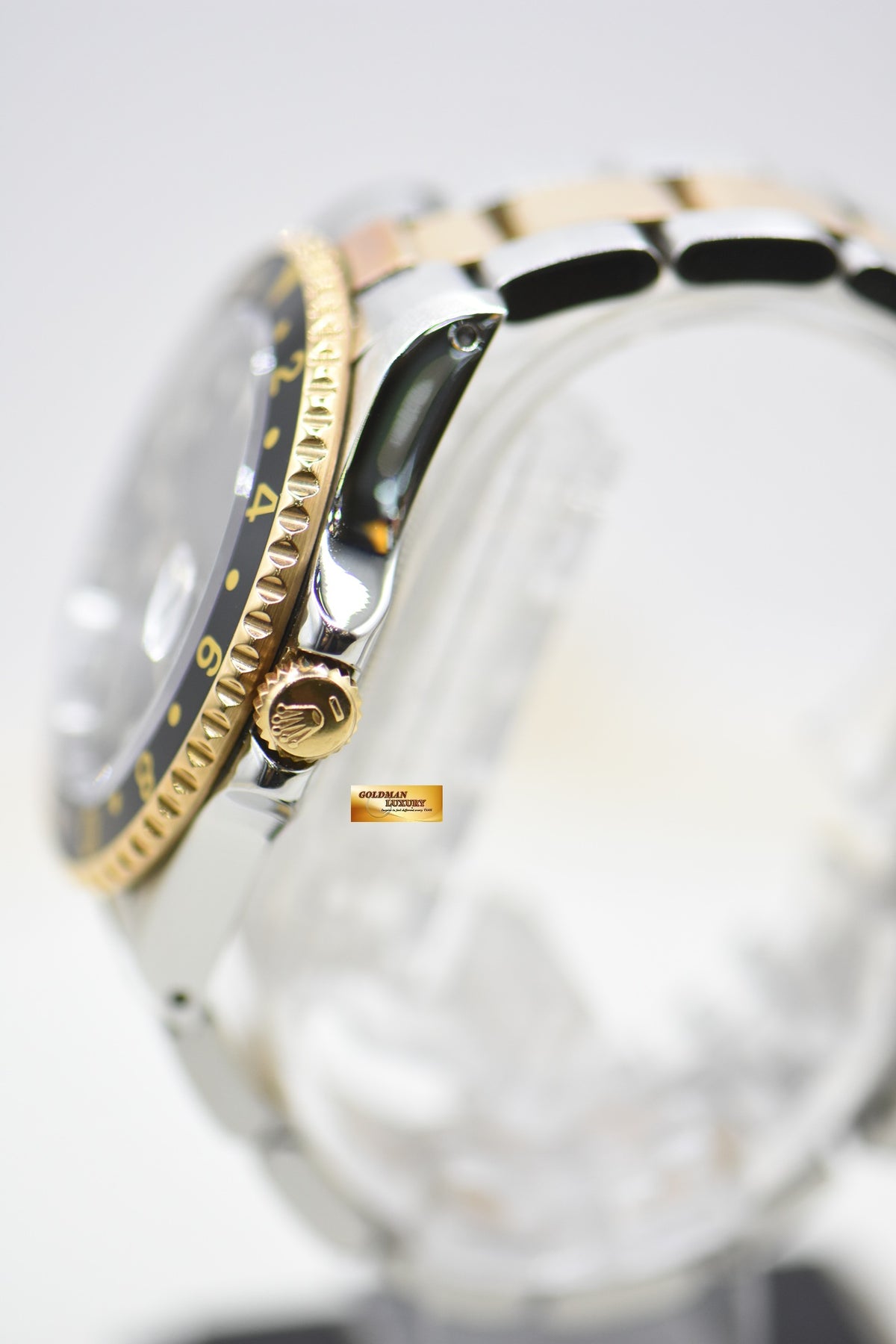 ROLEX OYSTER PERPETUAL GMT-MASTER 40mm HALF-GOLD OYSTER IN BRACELET BLACK “SWISS” DIAL 16753 (TRANSITIONAL-MODEL) (MINT)