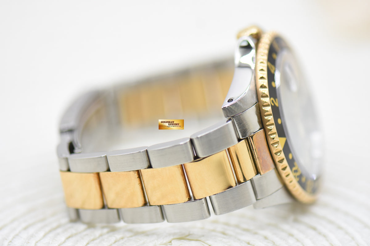 ROLEX OYSTER PERPETUAL GMT-MASTER 40mm HALF-GOLD OYSTER IN BRACELET BLACK “SWISS” DIAL 16753 (TRANSITIONAL-MODEL) (MINT)