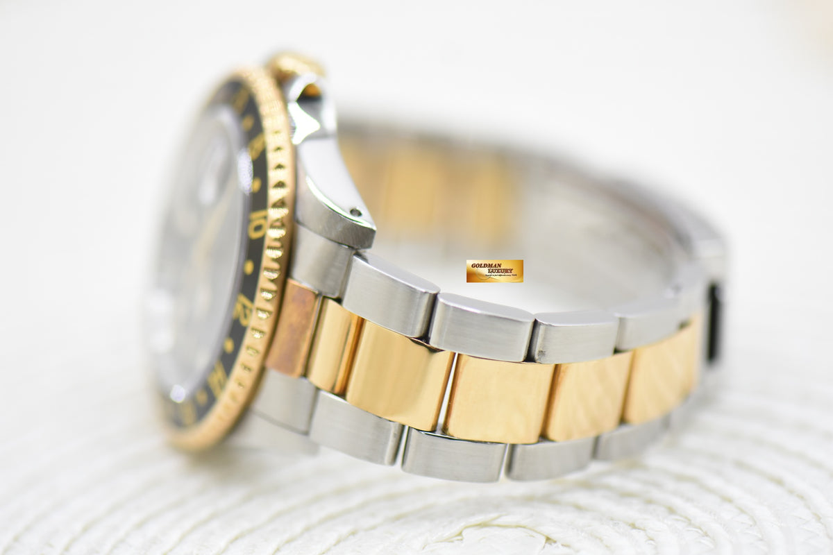 ROLEX OYSTER PERPETUAL GMT-MASTER 40mm HALF-GOLD OYSTER IN BRACELET BLACK “SWISS” DIAL 16753 (TRANSITIONAL-MODEL) (MINT)