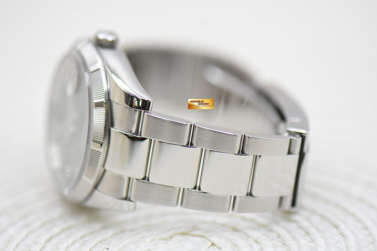 ROLEX OYSTER DATE 34mm STEEL IN OYSTER BRACELET BLACK DIAMOND DIAL 115210 (MINT)