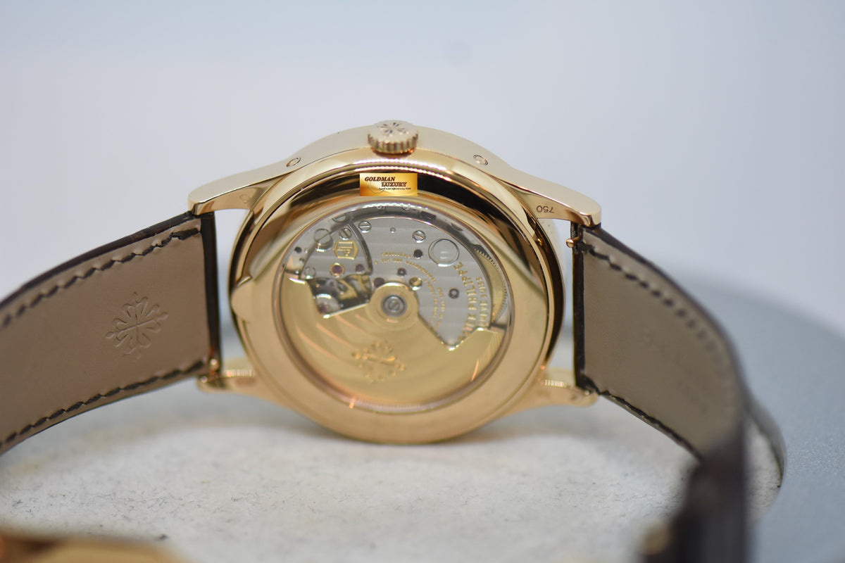 PATEK PHILIPPE ANNUAL CALENDAR 38.5mm ROSE GOLD IN LEATHER STRAP BLUE SUNBURST DIAL w/BAGUETTE DIAMONDS MARKERS 5396R AUTOMATIC (LNIB)