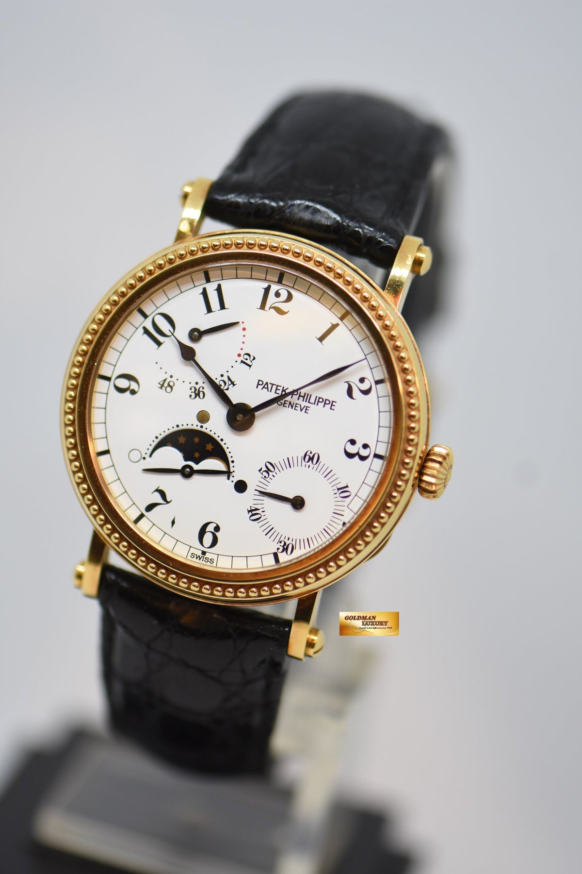 PATEK PHILIPPE CALATRAVA 35mm MOONPHASE POWER RESERVE 18K YELLOW GOLD OFFICERS CASE 5015J AUTOMATIC (MINT)