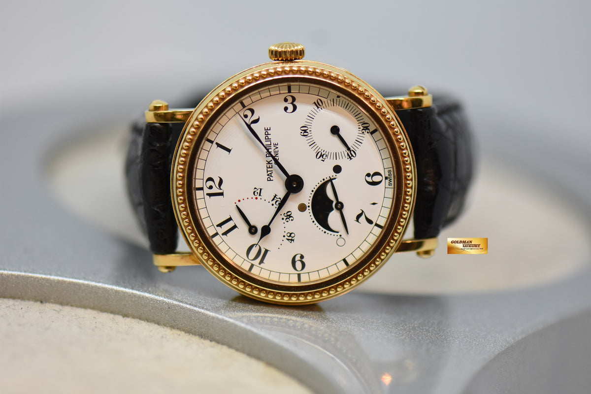 PATEK PHILIPPE CALATRAVA 35mm MOONPHASE POWER RESERVE 18K YELLOW GOLD OFFICERS CASE 5015J AUTOMATIC (MINT)