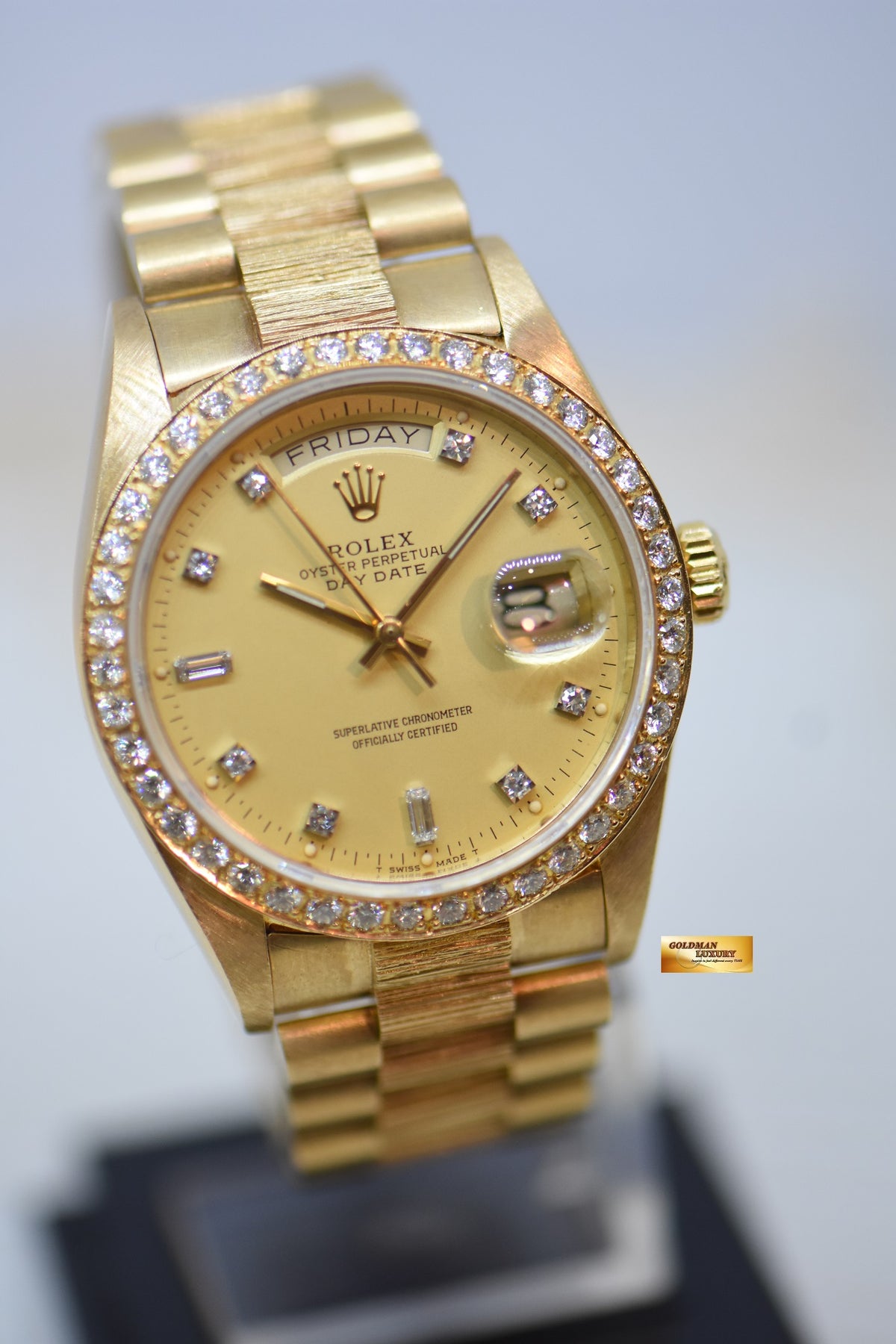ROLEX OYSTER PERPETUAL DAY-DATE 36mm YELLOW GOLD IN PRESIDENT BARK BRACELET GOLD DIAMOND DIAL CUSTOM DIAMOND BEZEL (SINGLE QUICK-SET DATE) 18078 (MINT)