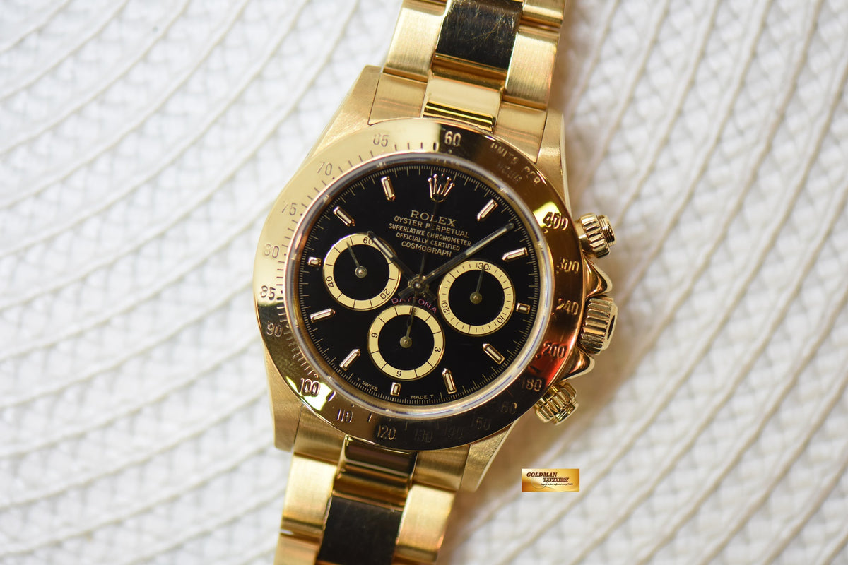 ROLEX OYSTER DAYTONA 18K YELLOW GOLD IN BRACELET INVERTED 6 ZENITH MVT “PATRIZZI” BLACK DIAL (RARE-VINTAGE)