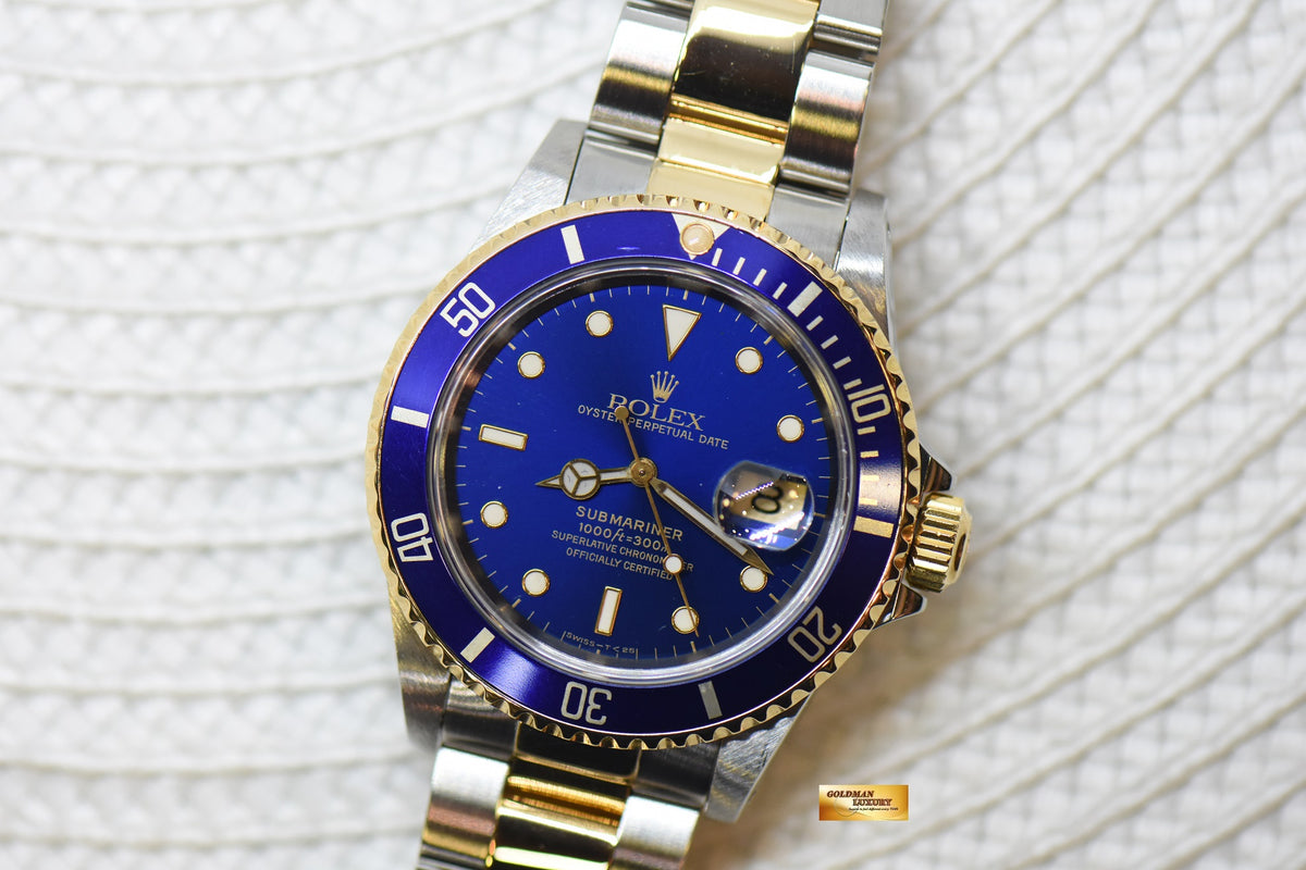 [SOLD] ROLEX OYSTER SUBMARINER 40mm GOLD / STEEL BLUESY TRITIUM DIAL 16613LB (MINT)