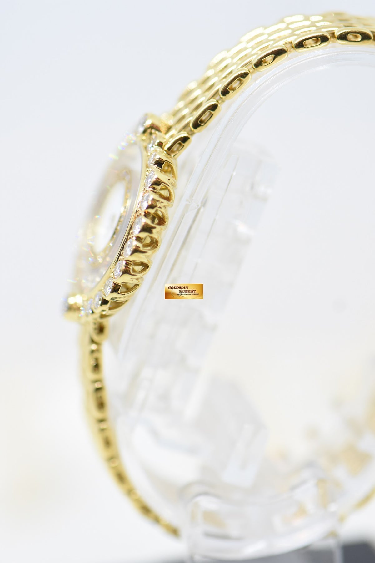 [SOLD] CHOPARD HAPPY DIAMONDS LADIES YELLOW GOLD IN BRACELET IN 7 DANCING DIAMONDS & DIAMOND BEZEL QUARTZ 20/4180 (MINT)
