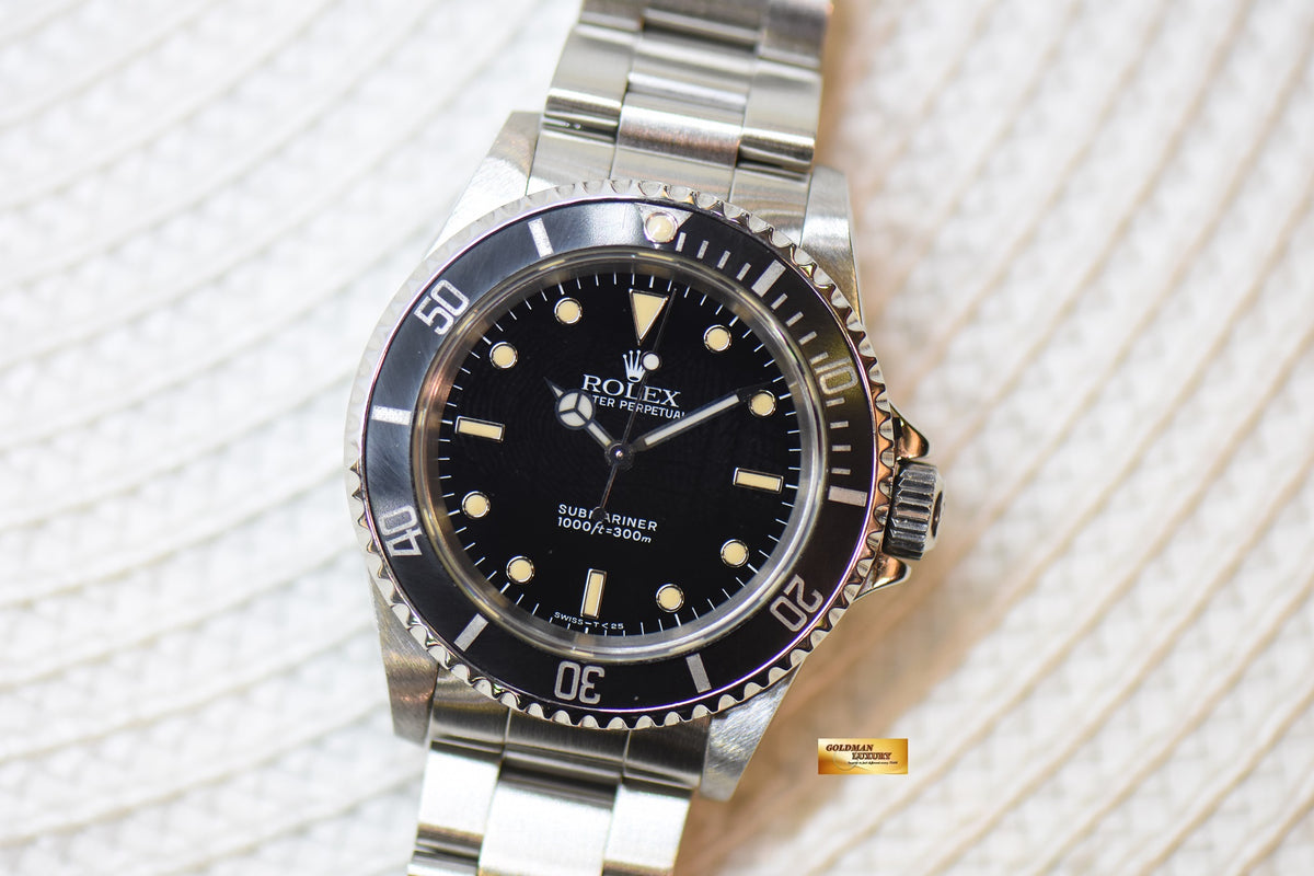 [SOLD] ROLEX OYSTER SUBMARINER NO DATE 40mm BLACK TRITIUM DIAL 2 LINERS STEEL 14060 (AGED PERTINA)