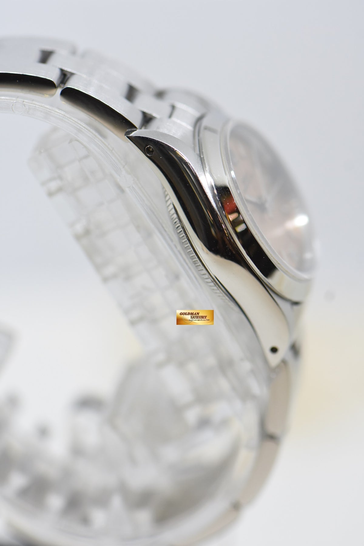 [SOLD] ROLEX OYSTER PERPETUAL 24mm LADIES STEEL ON BRACELET SALMON DIAL 67180 (MINT)