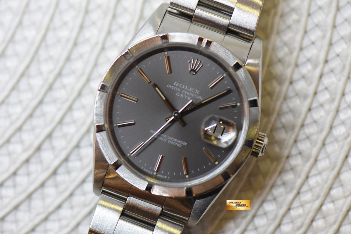 [SOLD] ROLEX OYSTER PERPETUAL DATE 34mm STEEL IN BRACELET GREY DIAL “STEEL ENGINE-TURNED” BEZEL 15210 (MINT)