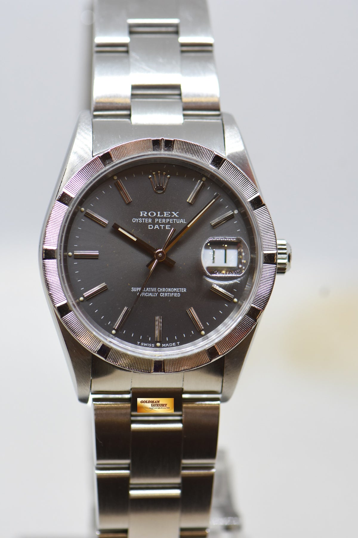 [SOLD] ROLEX OYSTER PERPETUAL DATE 34mm STEEL IN BRACELET GREY DIAL “STEEL ENGINE-TURNED” BEZEL 15210 (MINT)