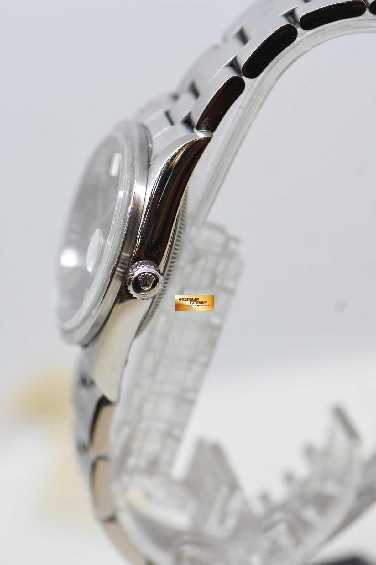 [SOLD] ROLEX OYSTER PERPETUAL DATE 34mm STEEL IN BRACELET GREY DIAL “STEEL ENGINE-TURNED” BEZEL 15210 (MINT)