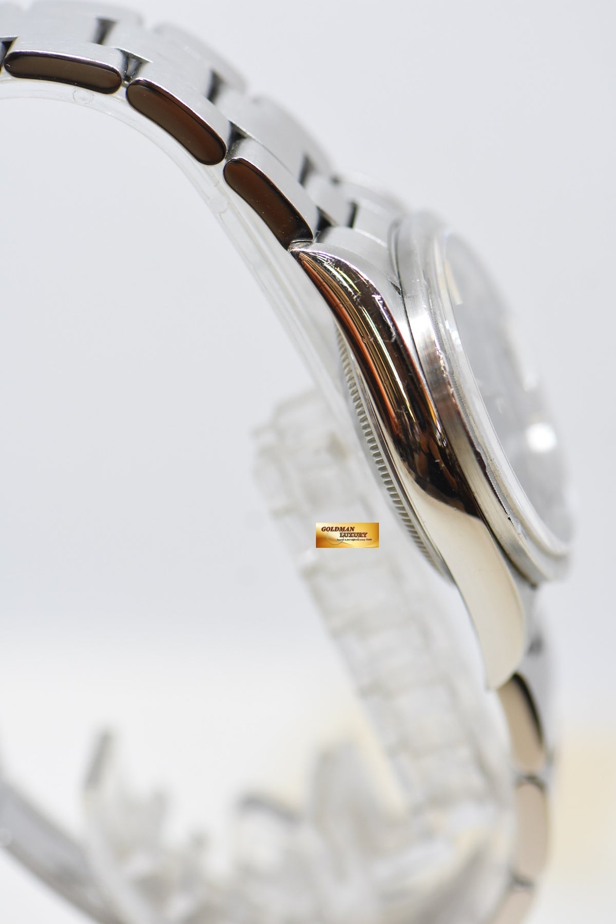 [SOLD] ROLEX OYSTER PERPETUAL DATE 34mm STEEL IN BRACELET GREY DIAL “STEEL ENGINE-TURNED” BEZEL 15210 (MINT)