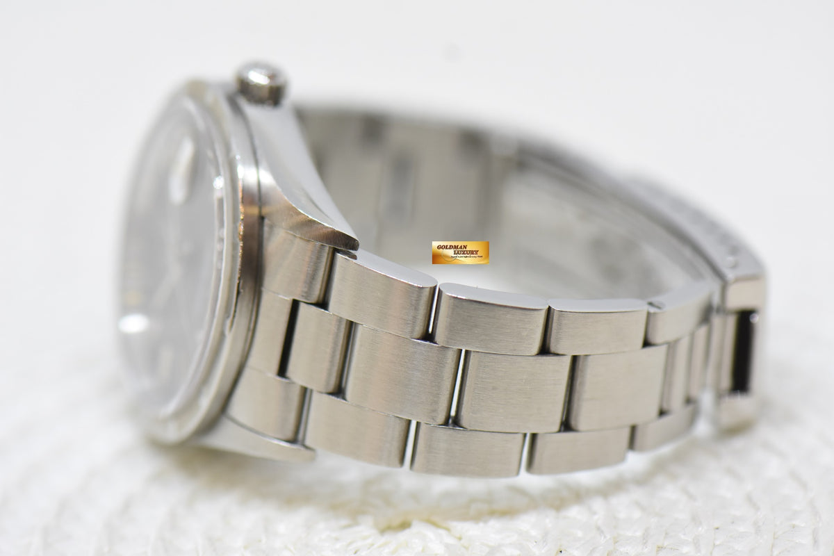 [SOLD] ROLEX OYSTER PERPETUAL DATE 34mm STEEL IN BRACELET GREY DIAL “STEEL ENGINE-TURNED” BEZEL 15210 (MINT)