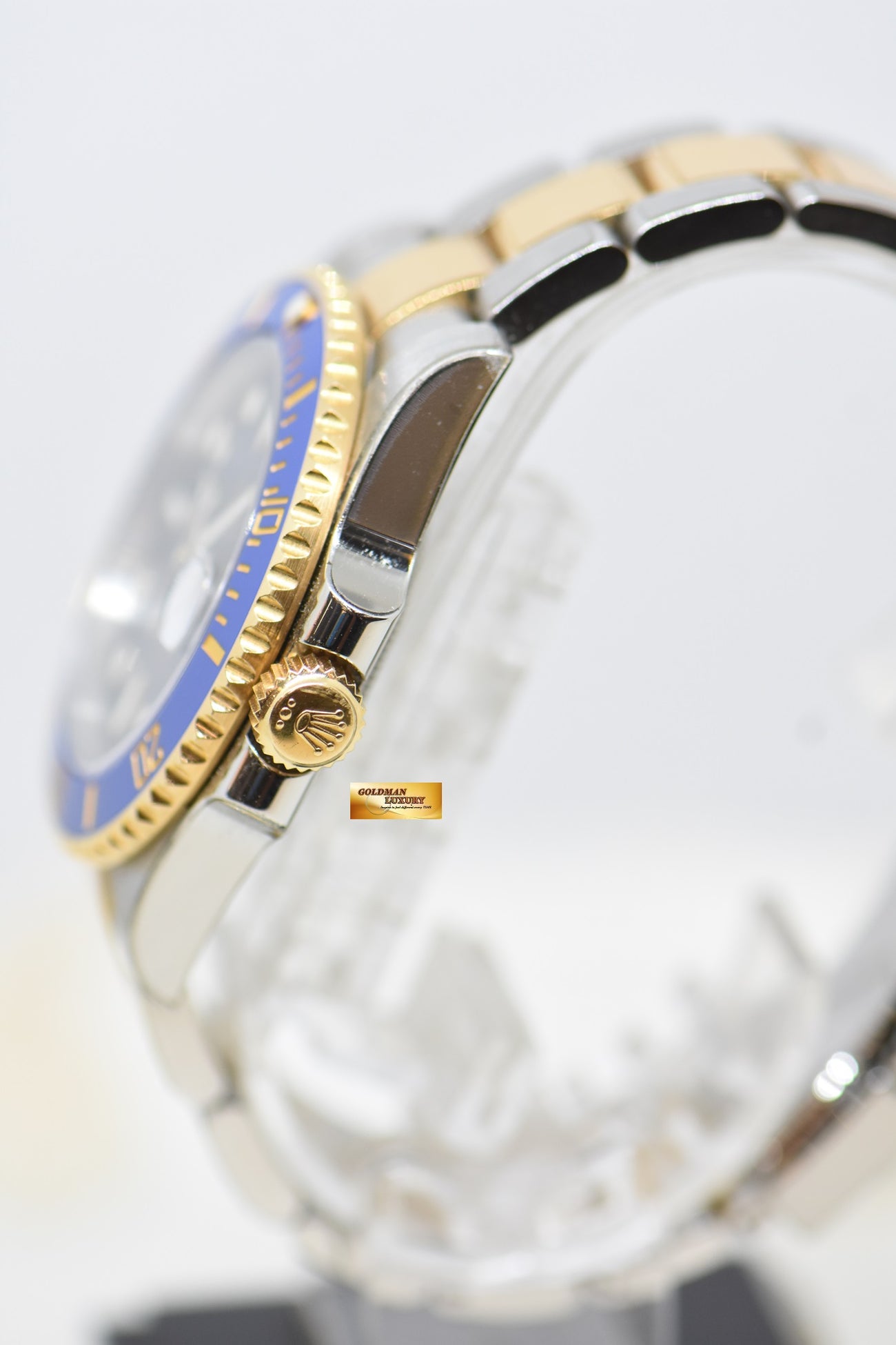 SOLD] ROLEX SUBMARINER 40mm HALF GOLD IN BRACELET SUNBURST BLUE