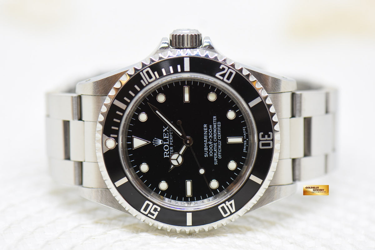 [SOLD] ROLEX OYSTER SUBMARINER NO DATE 4-LINERS 40mm STEEL BLACK 14060M (MINT)