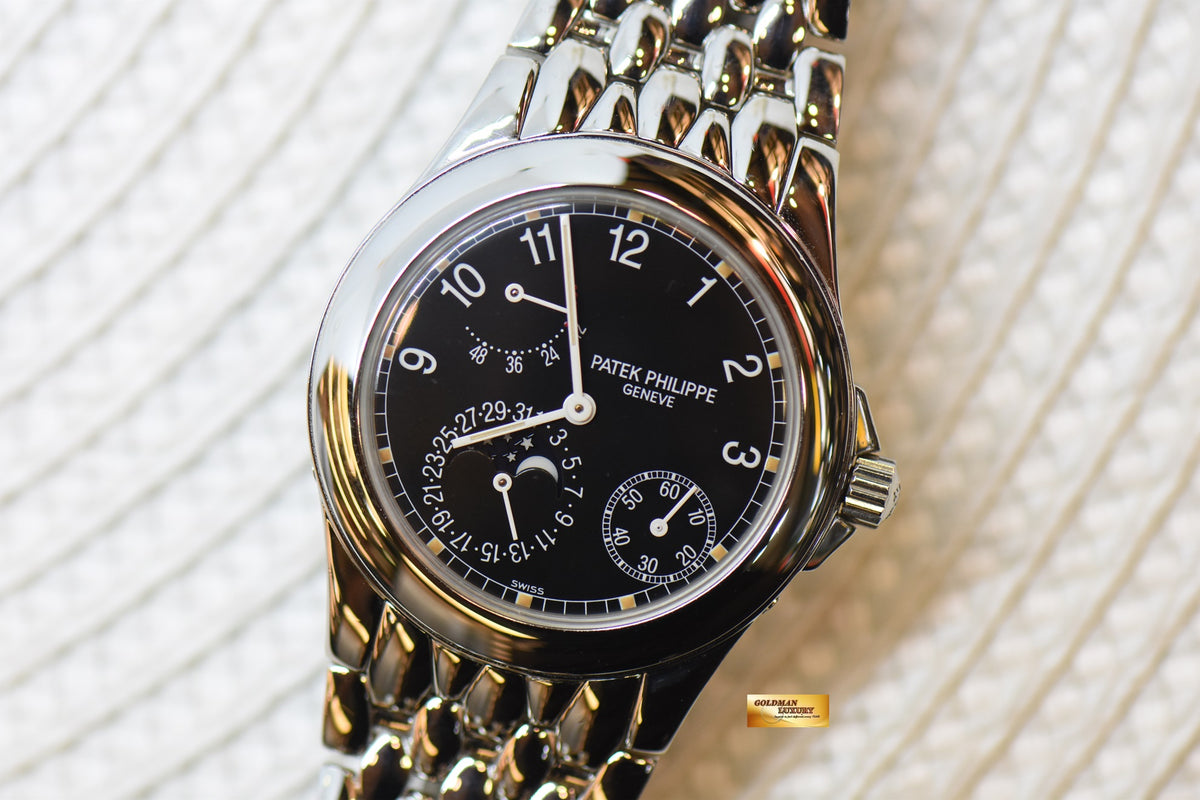 [SOLD] PATEK PHILIPPE NEPTUNE POWER RESERVE MOONPHASE STEEL IN BRACELET AUTOMATIC 5085/1A (MINT)