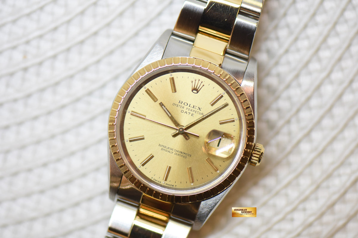 [SOLD] ROLEX OYSTER DATE 34mm HALF-GOLD IN OYSTER BRACELET GOLD DIAL 15223 (MINT)