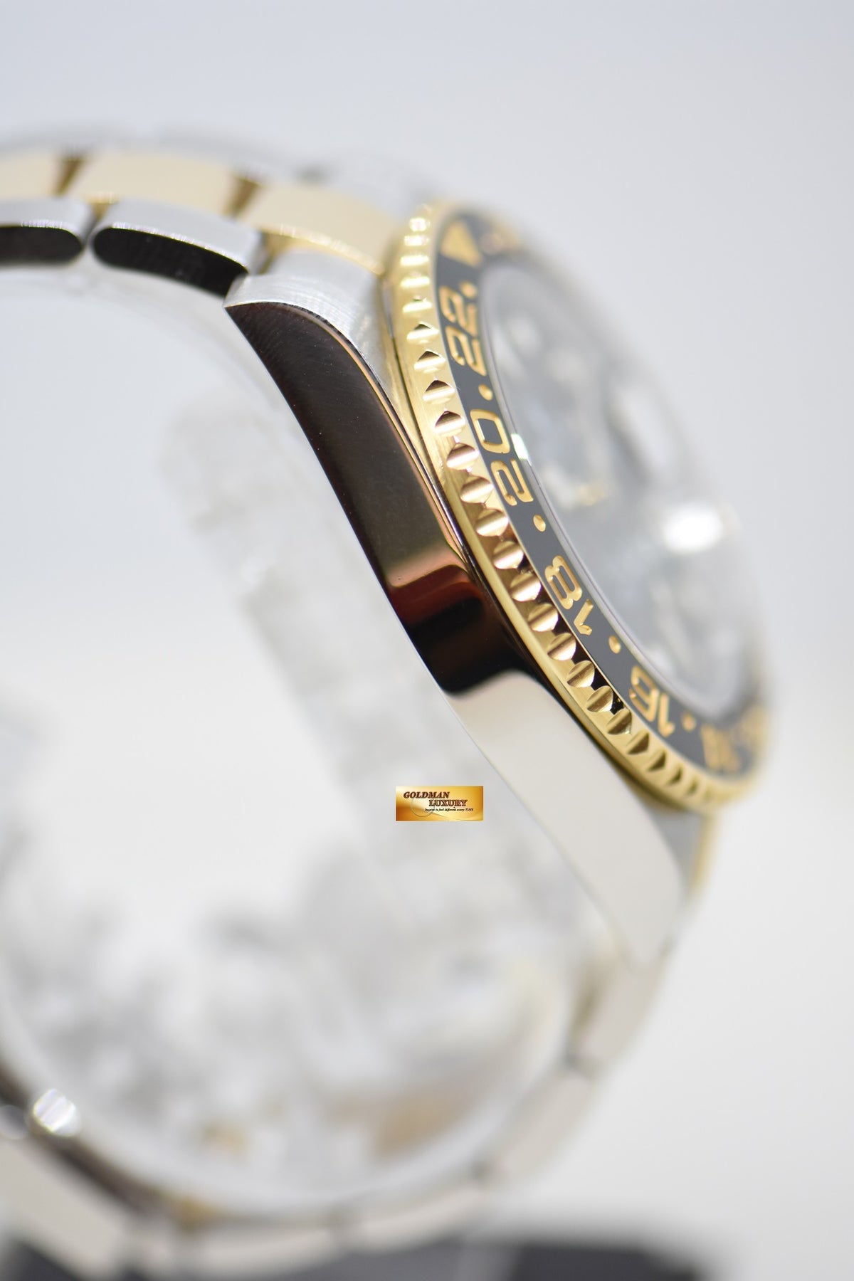 [SOLD] ROLEX OYSTER GMT-MASTER II 40mm HALF GOLD IN BRACELET BLACK DIAL 116713LN (MINT)