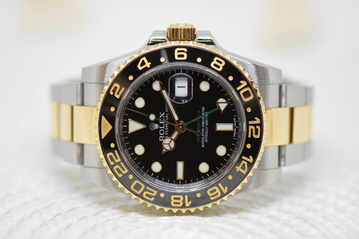 [SOLD] ROLEX OYSTER GMT-MASTER II 40mm HALF GOLD IN BRACELET BLACK DIAL 116713LN (MINT)