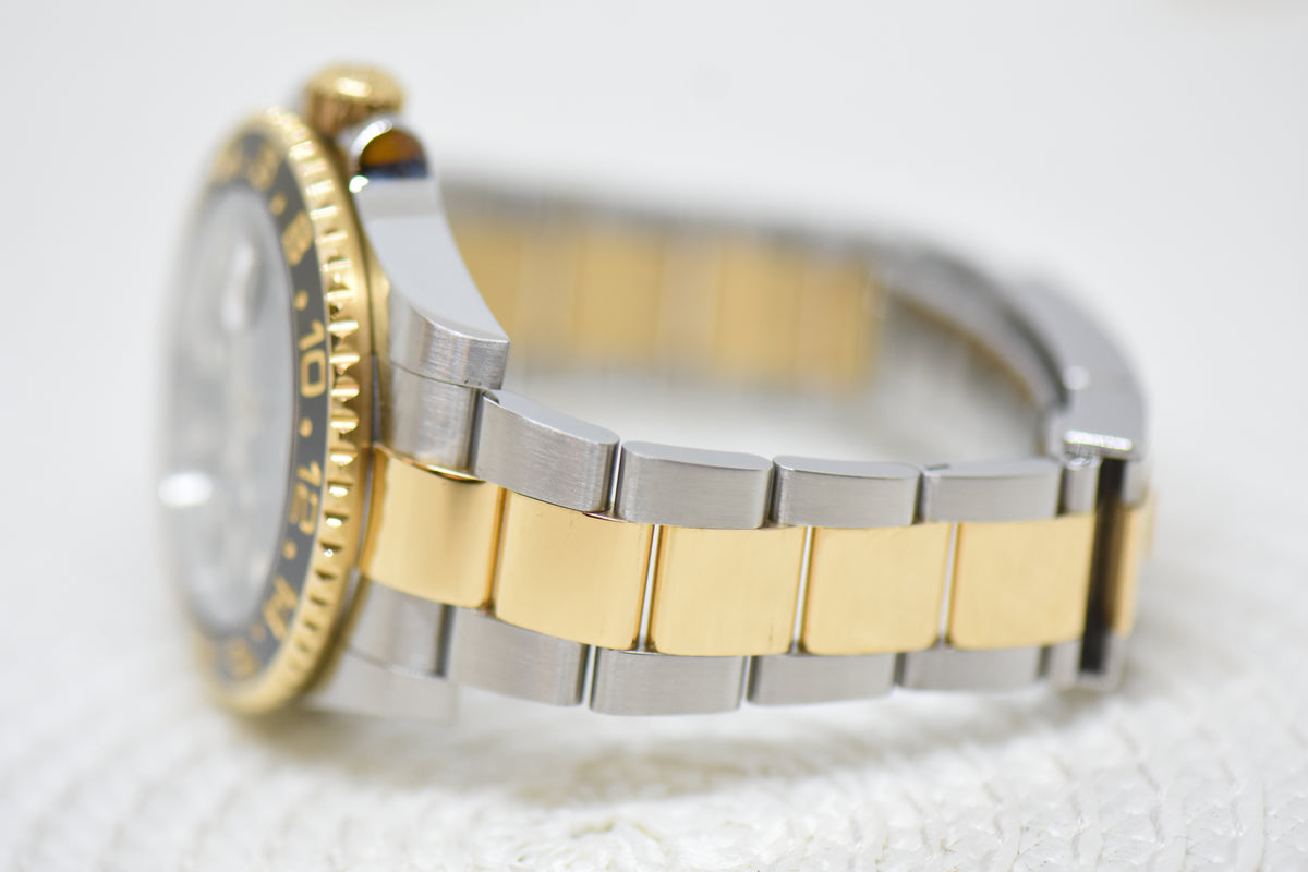 [SOLD] ROLEX OYSTER GMT-MASTER II 40mm HALF GOLD IN BRACELET BLACK DIAL 116713LN (MINT)