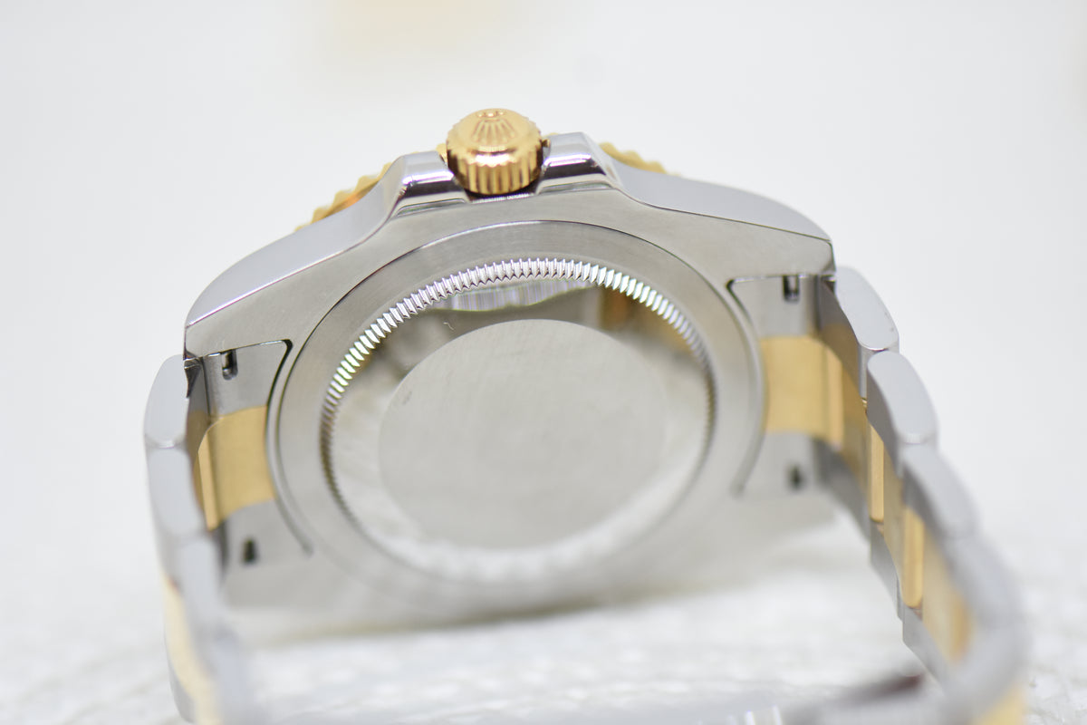 [SOLD] ROLEX OYSTER GMT-MASTER II 40mm HALF GOLD IN BRACELET BLACK DIAL 116713LN (MINT)