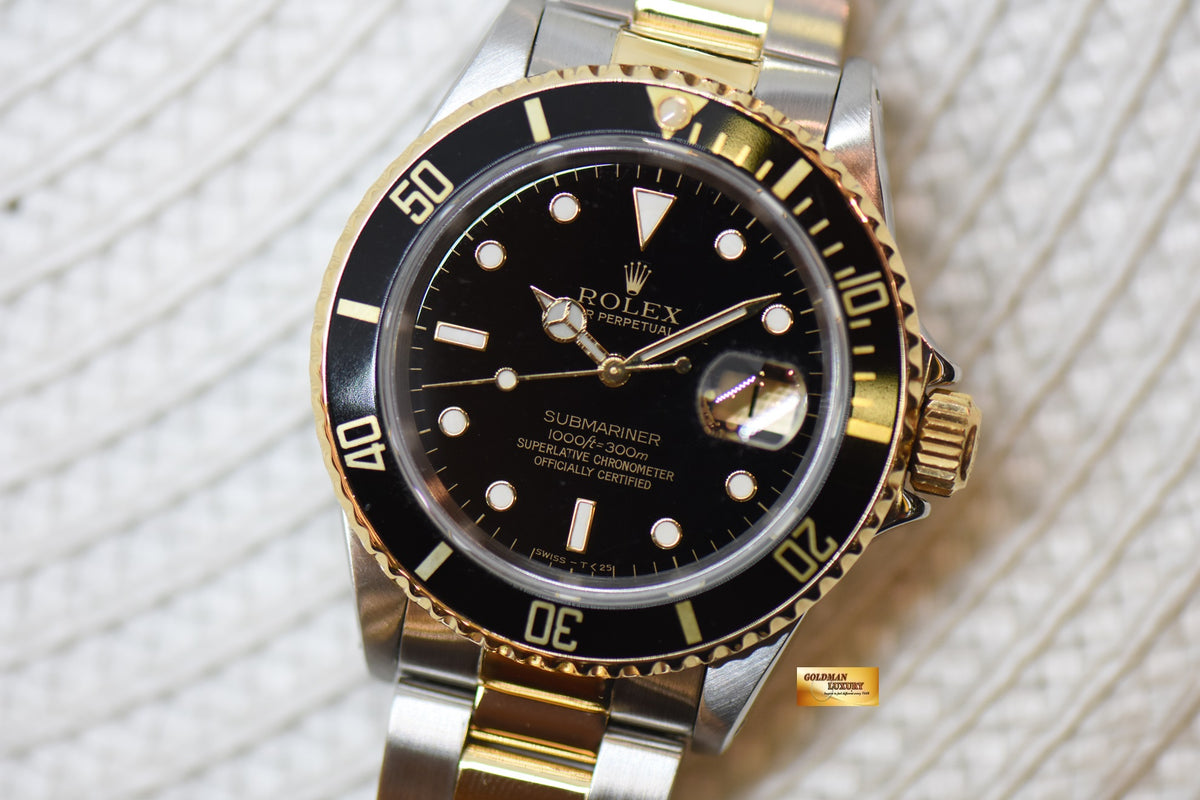 [SOLD] ROLEX OYSTER SUBMARINER 40mm HALF-GOLD IN OYSTER BRACELET BLACK TRITIUM DIAL 16613 (MINT)