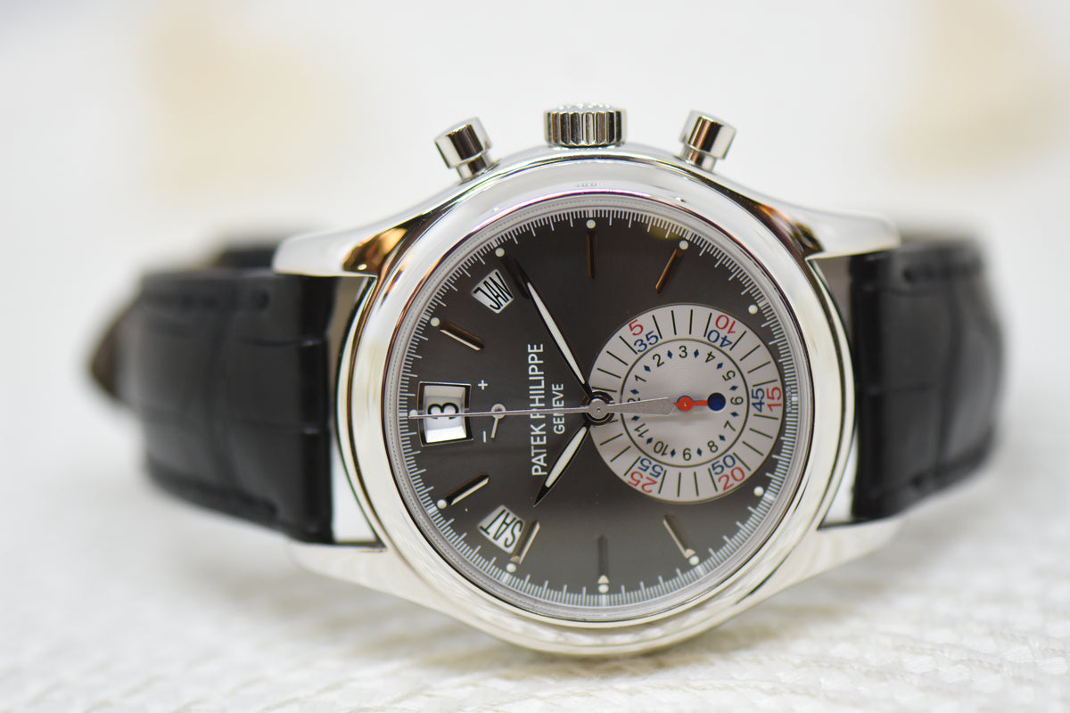 [SOLD] PATEK PHILIPPE ANNUAL CALENDAR FLYBACK CHRONOGRAPH 40.5mm PLATINUM IN LEATHER STRAP DARK GREY DIAL 5960P (MINT)