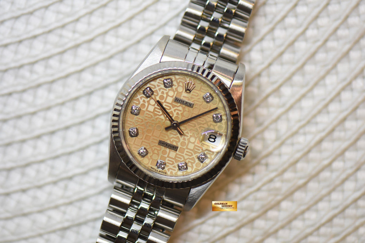 [SOLD] ROLEX OYSTER DATEJUST 31mm STEEL IN JUBILEE BRACELET COMPUTER SALMON DIAMOND DIAL 68274 (MINT)