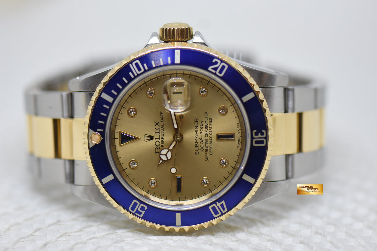 [SOLD] ROLEX OYSTER SUBMARINER 40mm HALF-GOLD SILVER SERTI DIAL 16613LB (MINT)