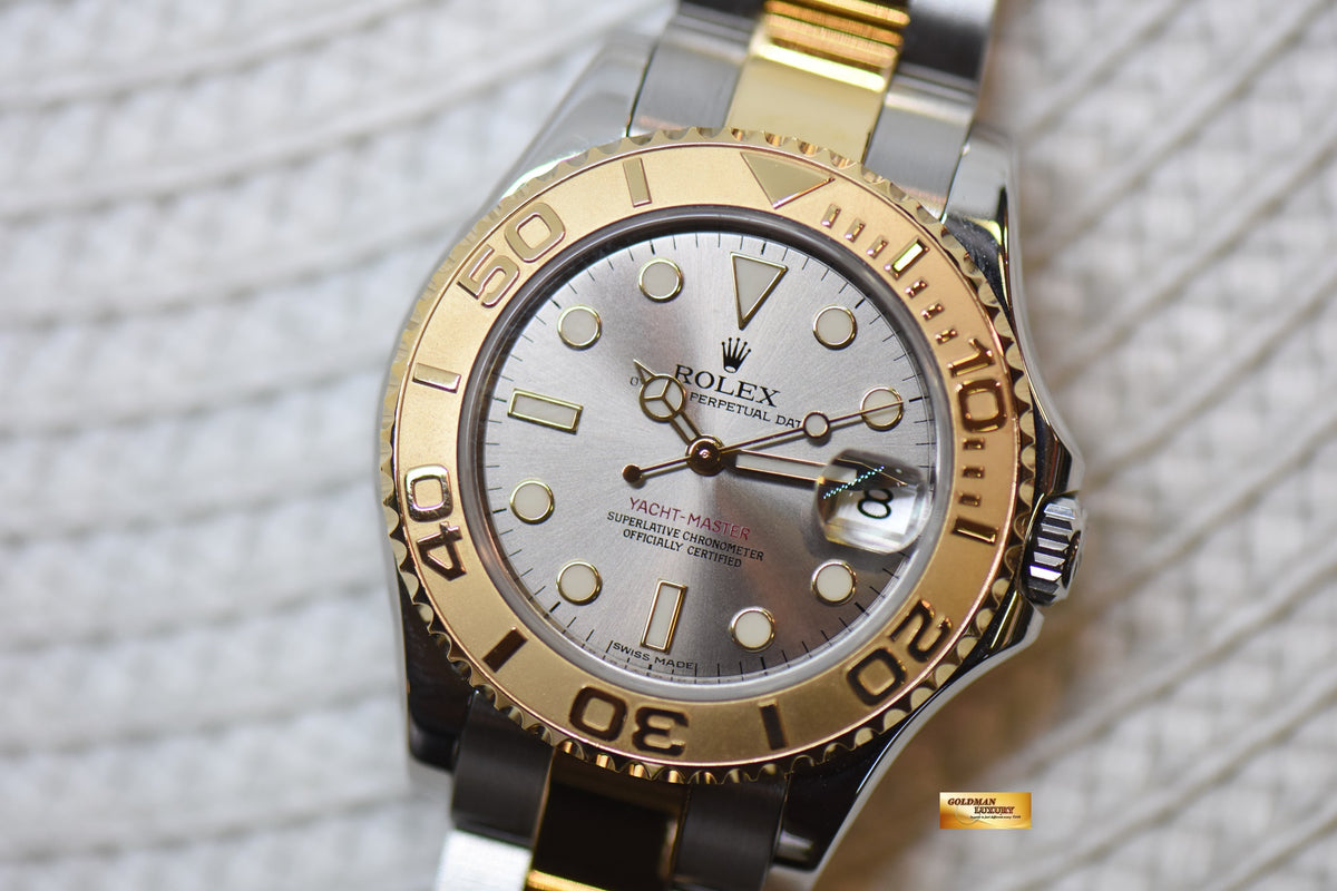 [SOLD] ROLEX OYSTER YACHT MASTER 35mm HALF GOLD IN  BRACELET SILVER DIAL 168623 (MINT)