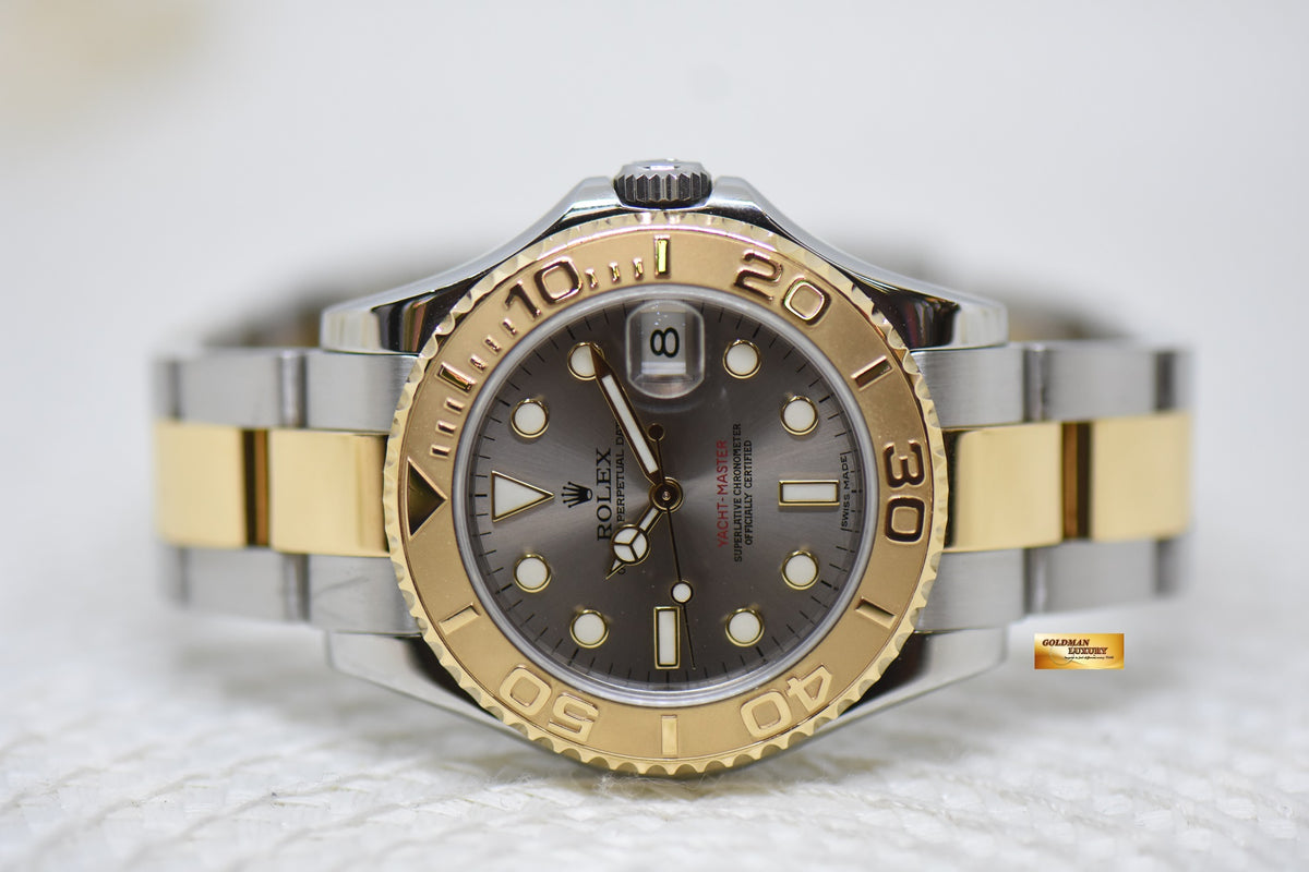 [SOLD] ROLEX OYSTER YACHT MASTER 35mm HALF GOLD IN  BRACELET SILVER DIAL 168623 (MINT)