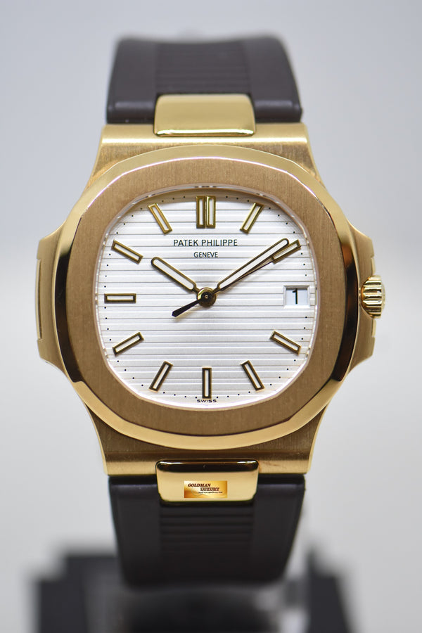 PATEK PHILIPPE NAUTILUS 40mm 18K YELLOW GOLD SILVER DIAL AUTOMATIC 5711/1J (MINT)