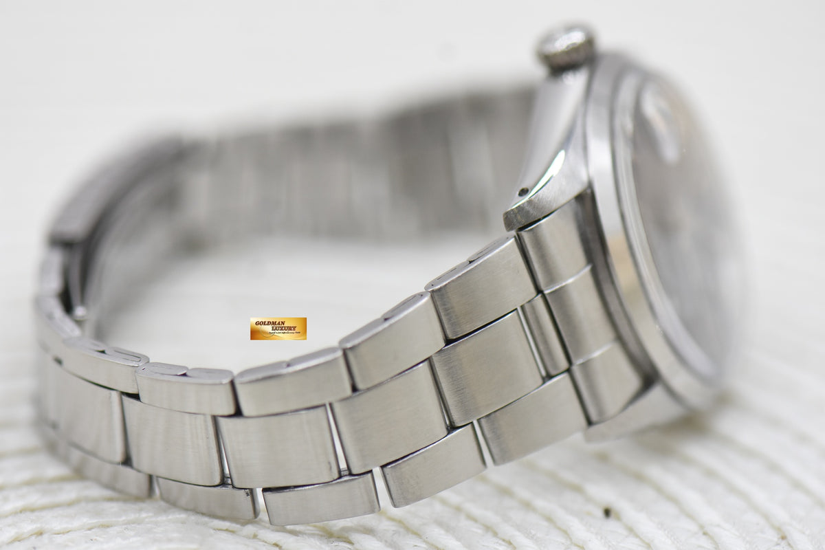 ROLEX OYSTER PERPETUAL DATE 34mm STEEL IN BRACELET AGED BLUE DIAL 1500 (VINTAGE)