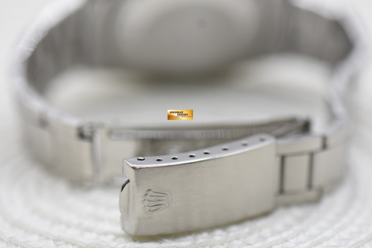 ROLEX OYSTER PERPETUAL DATE 34mm STEEL IN BRACELET AGED BLUE DIAL 1500 (VINTAGE)