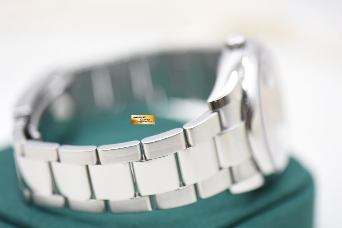 ROLEX OYSTER DATE 34mm STEEL OYSTER BRACELET BLACK ROMAN DIAL 115200 (MINT)